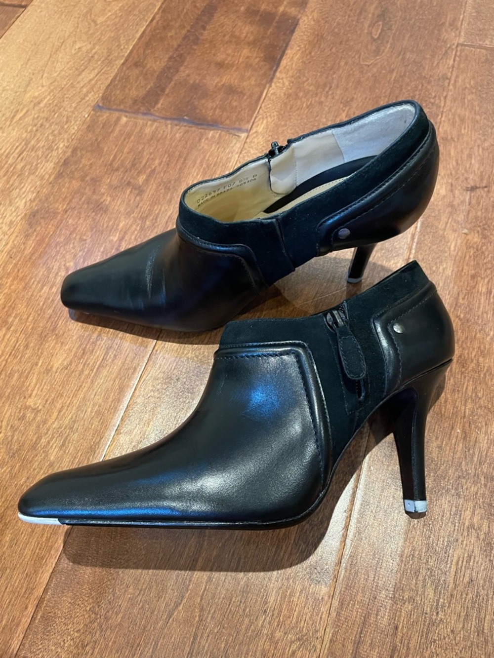 Black leather stiletto mini boots